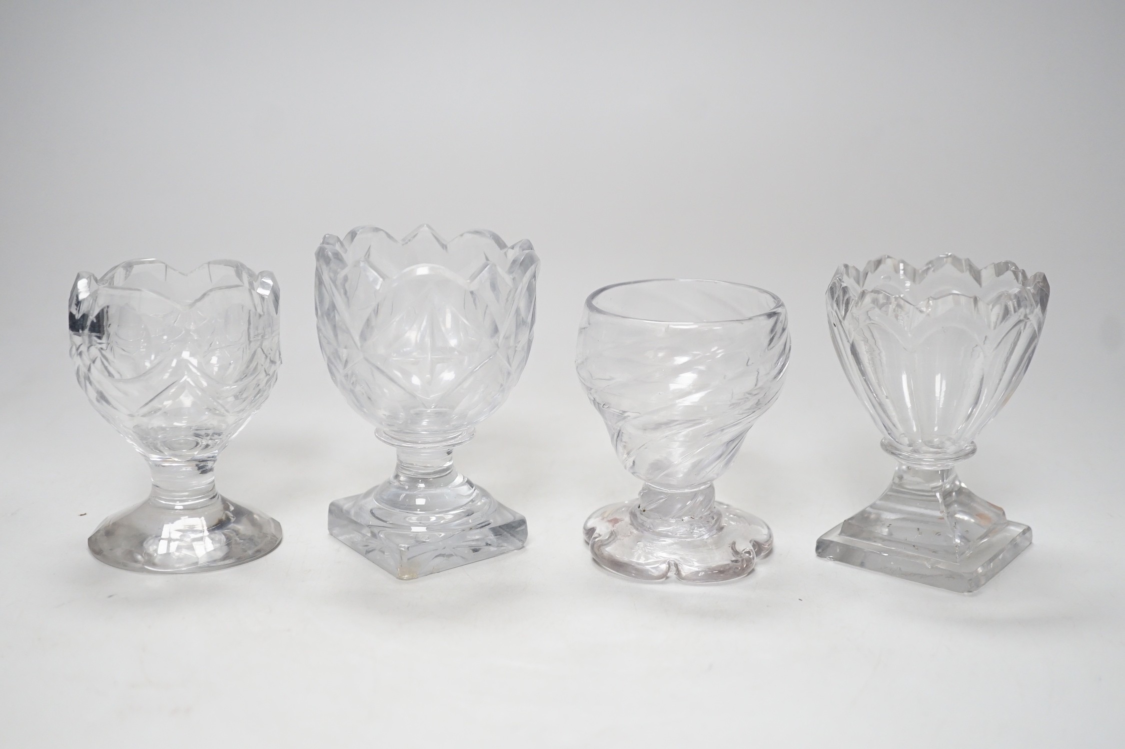 Four 18th century Georgian glass salt cellars, tallest 9cm